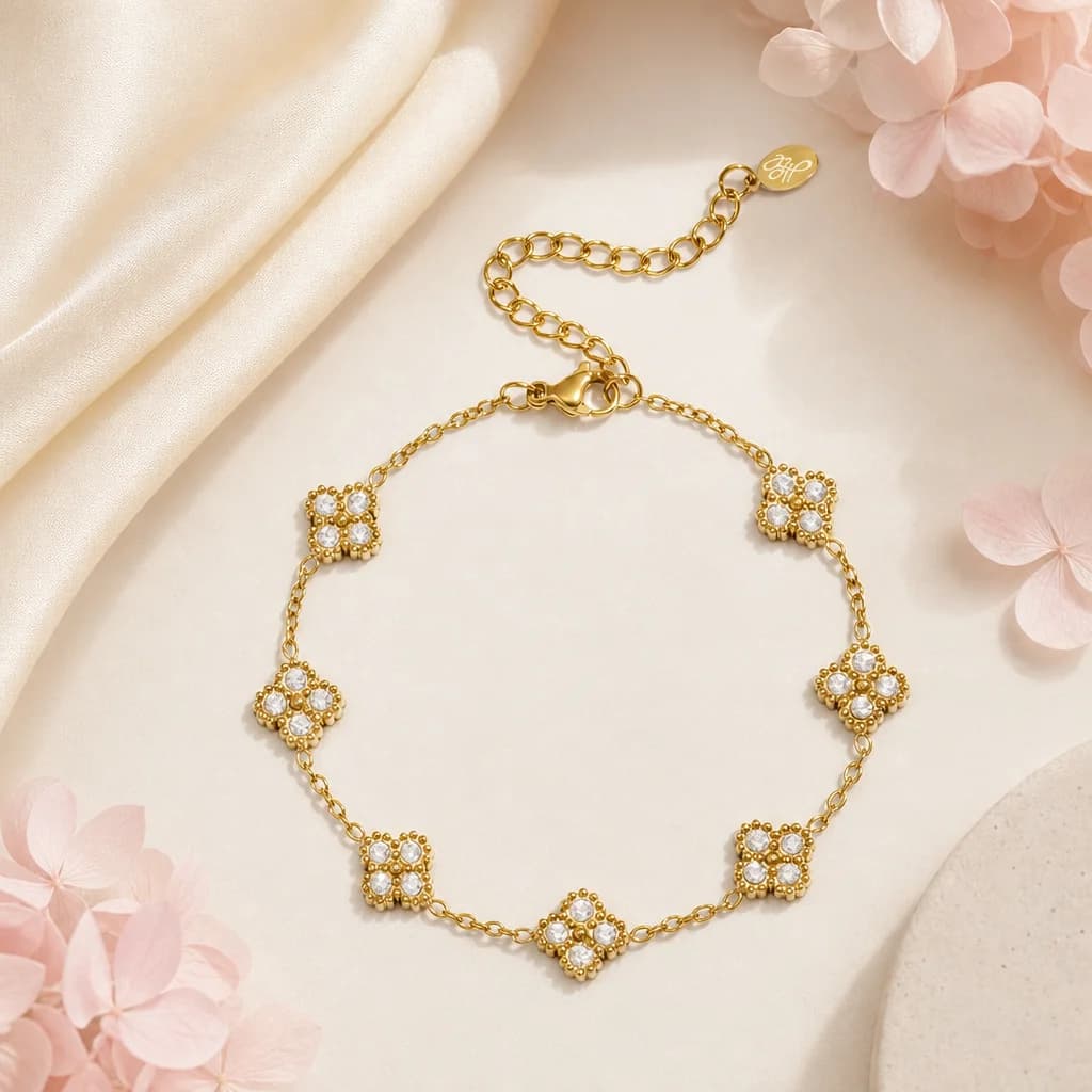 Armband met zirkonia klavers goud
