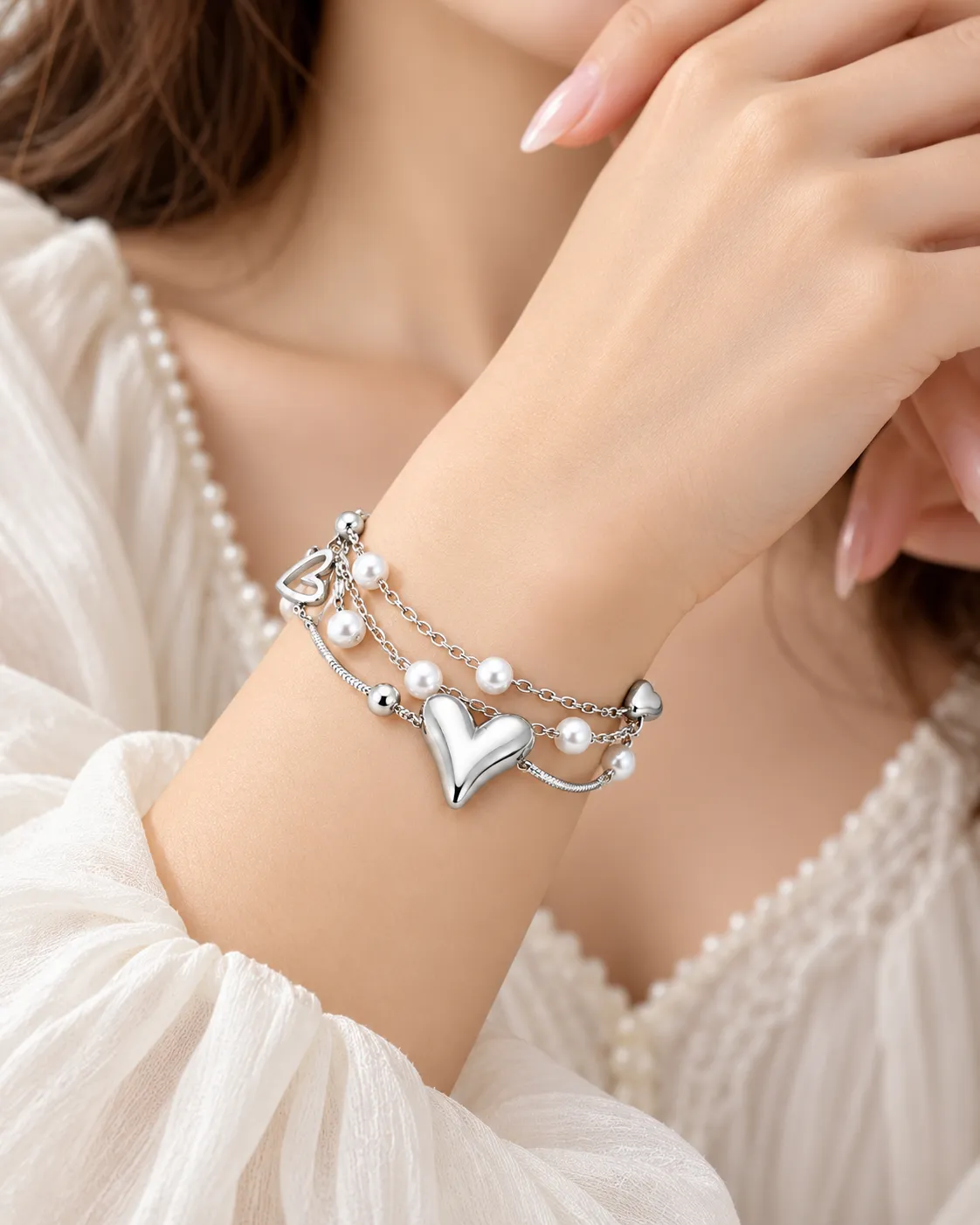 Hartjes armband met pareldetails