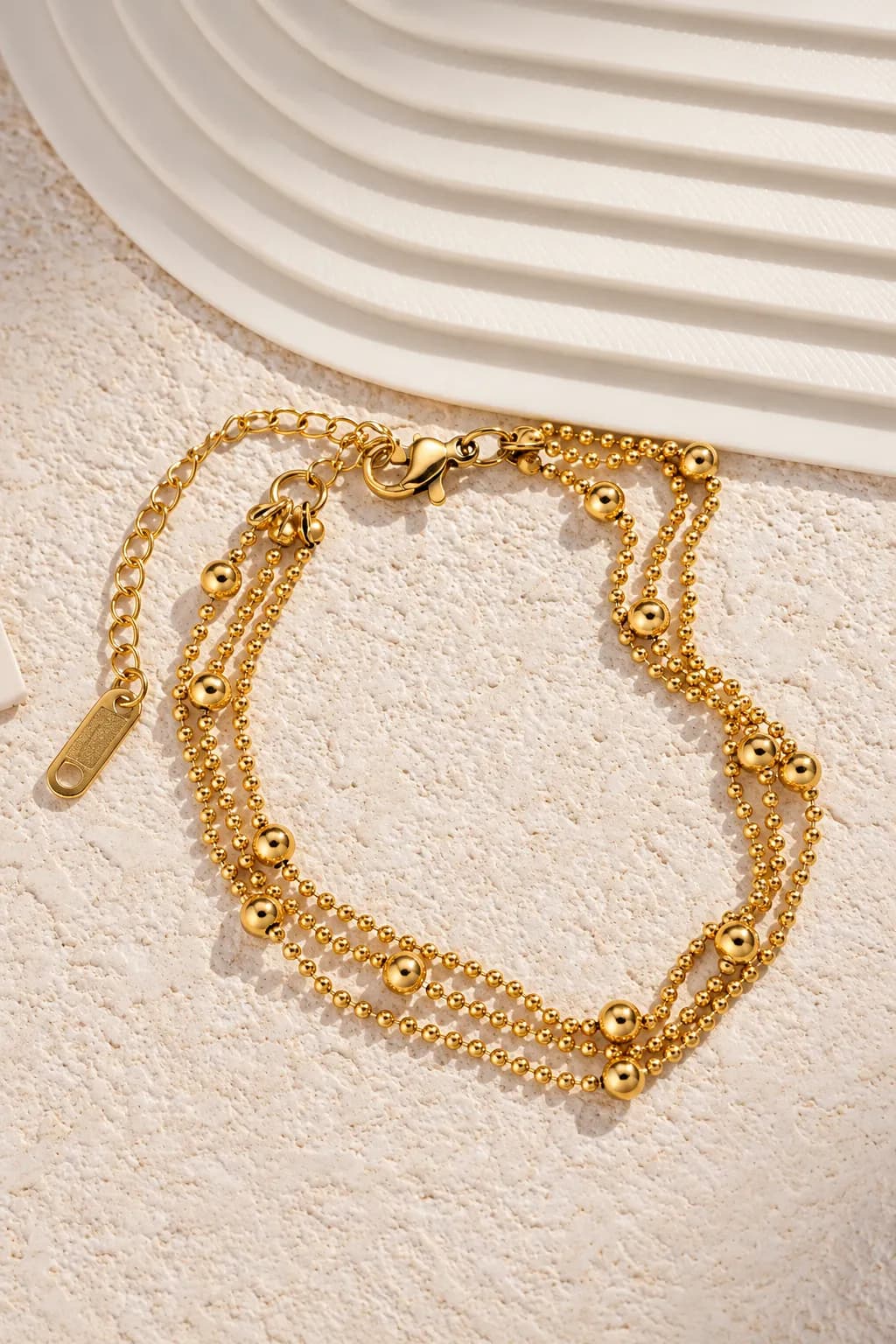 Driedubbele armband goud met bolletjes
