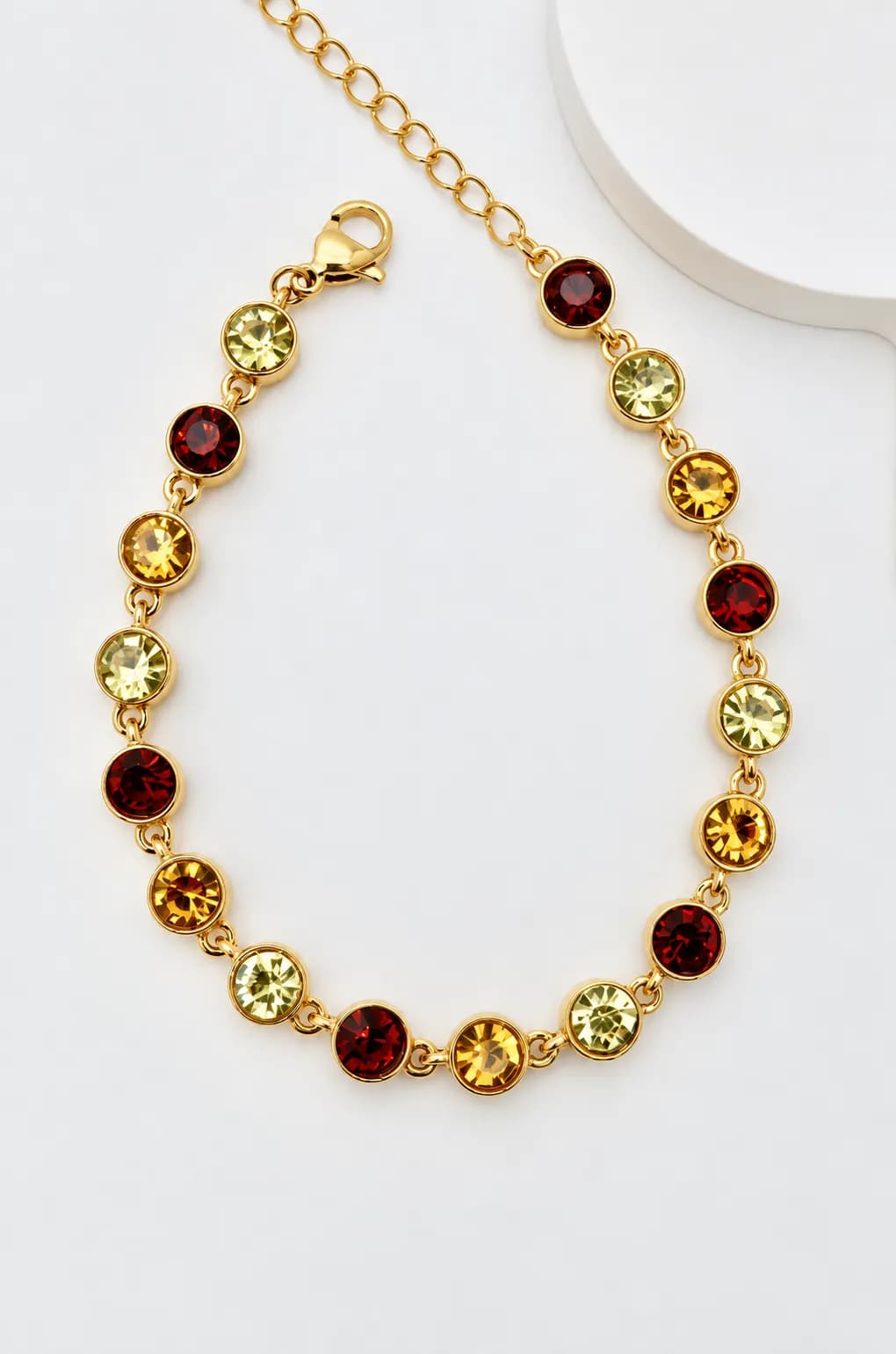Gouden armband met ronde steentjes multicolor