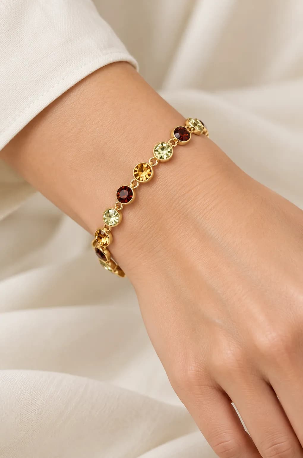 Gouden armband met ronde steentjes multicolor